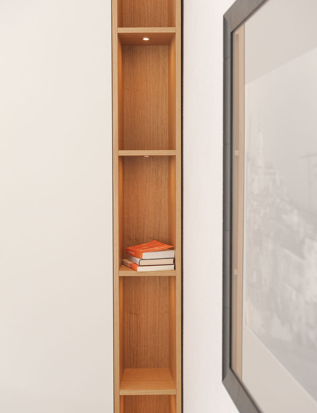 Schrankwand mit integriertem Bücherregal - Schreinerei TEKO München